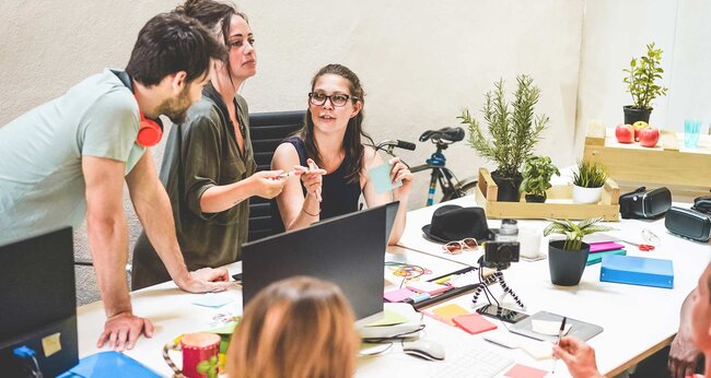 group of interns working in an office