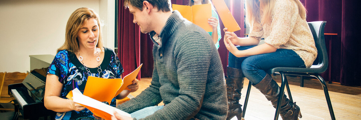 Stage actors rehearsing