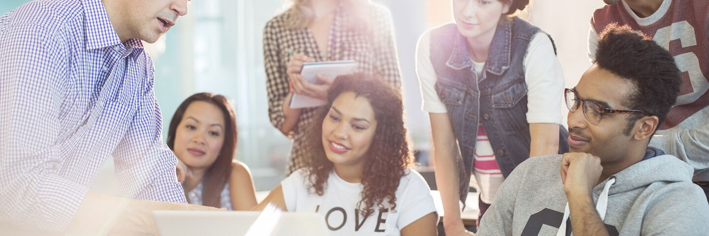 Group of students learning english