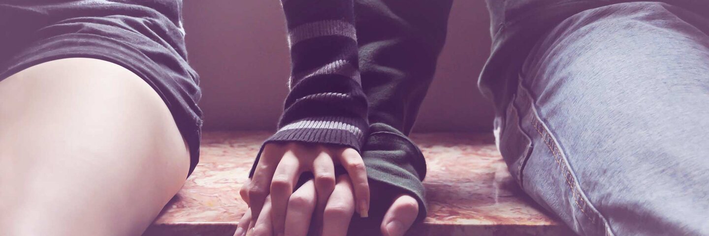 hand holding on top another
