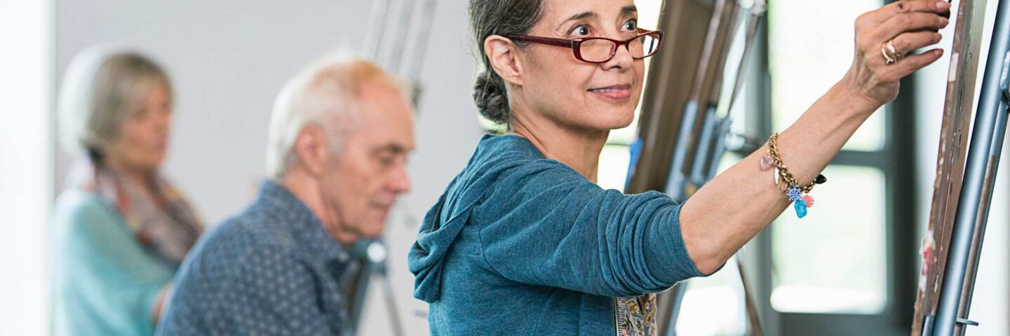 Adults drawing in a studio