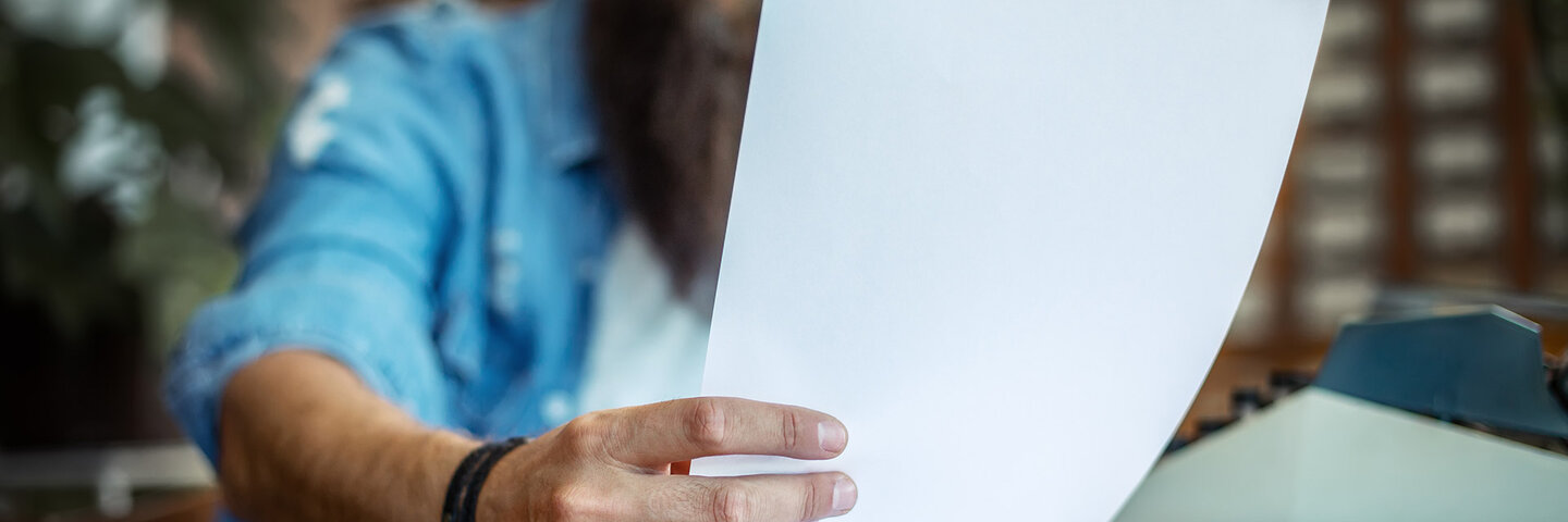 Man reviewing his writing