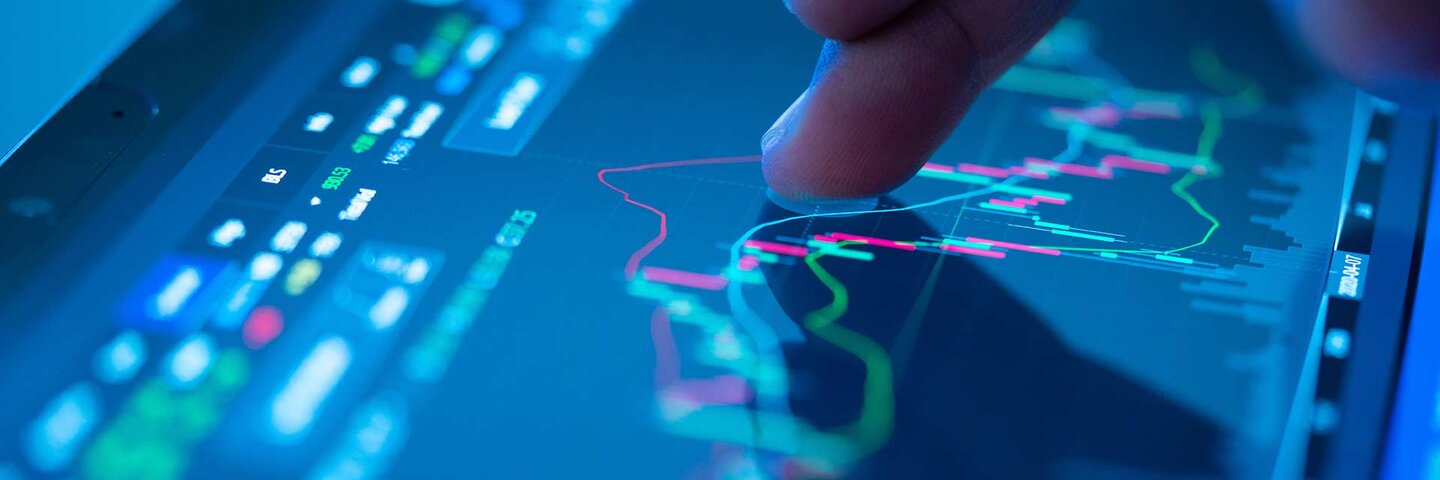 Businessman checking stock market data