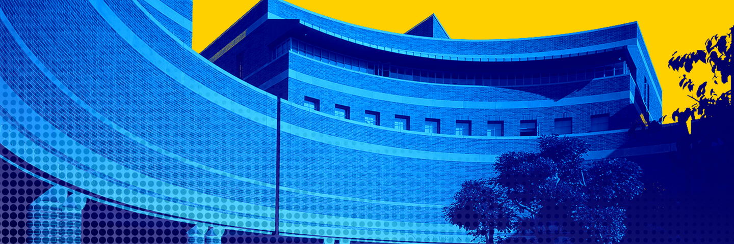 Curved brick exterior of UCLA Anderson School of Management.