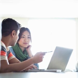 students working on their laptop