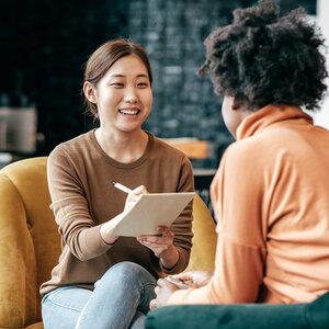 woman talking with another woman