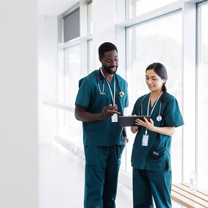 two young nurses have a discussion